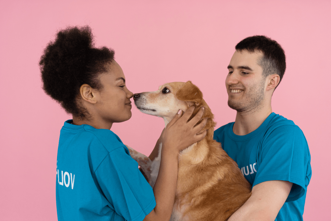couple with adopted dog